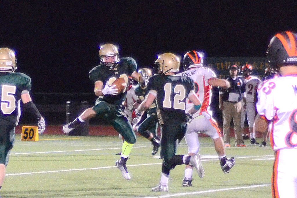 HORNET SOPHOMORE John Merullo intercepted this Ipswich pass on the first play of the second half as North Reading dominated the Tigers in every phase of the game Friday night. (John Friberg Photo)