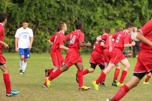 THE WMHS boys’ soccer team ran onto the field during its 4-2 victory in Stoneham. The Warriors prevailed again last night at Walton Field as they blanked Melrose, 3-0. (Donna Larsson File Photo)