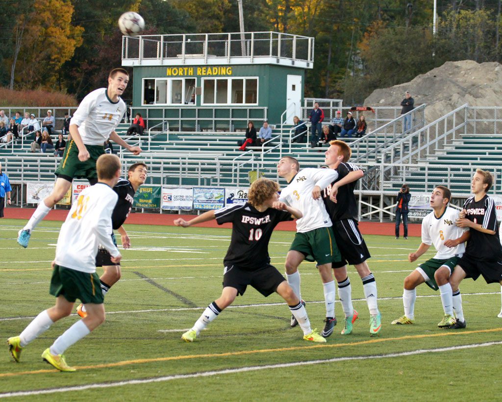 HEAD AND SHOULDERS above the competition, Hornet John Lewis, (at left) scored five goals in North Reading's 5–1 win over Ipswich. The Green and Gold improved to 8–2–2 with the win. (John Intorcio Photo)