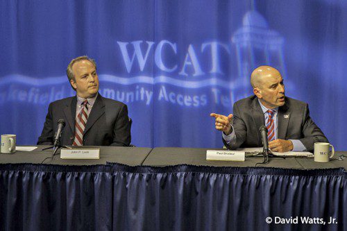 GREENWOOD REPUBLICAN John Lock (left) listens as incumbent state Rep. Paul Brodeur (D-Melrose) makes a point during a debate last Wednesday, Oct. 1. (David Watts Jr. Photo)