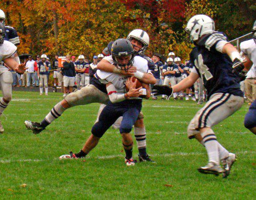COLLARED. Drew McCarthy (1) is wrapped up short of the end zone on this third quarter carry versus the Generals Saturday. (Tom Condardo Photo)