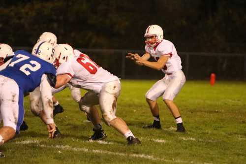 MELROSE QUARTERBACK Jake Karelas threw for over 200 yards with three touchdowns against Stoneham during Melrose's 27-0 shutout against the Spartans last Friday. Melrose will host Wakefield in the opening round of the MIAA Div. 3 Northwest playoffs tonight, October 31 at Fred Green Field in Melrose. (Donna Larsson photo)