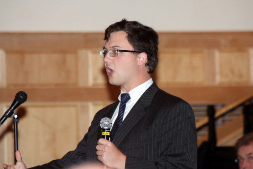 MICHAEL WALSH explains the basis behind his citizens' petition proposal to make changes to the Town Charter that would eliminate the Town Administrator position by reverting back to an Executive Assistant role in place prior to 1993. The proposal failed.    (Maureen Doherty Photo)