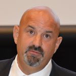SELECTMAN MIKE PRISCO urged voters at Town Meeting to approve the deal to allow the town to control development of the JT Berry property. (Bob Turosz Photo)