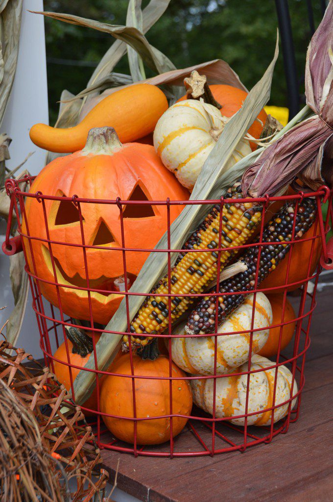 THE OFFICIAL ARRIVAL of fall signals the season for autumn decorations. One of the earliest and the most colorful was spotted on a  Bow St. porch. (Bob Turosz Photo)