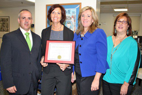 SECRETARY OF EDUCATION Matthew Malone visited Summer Street School on Oct. 21 after the elementary school was selected as a 2014 Commendation School by the Department of Education. Malone toured Summer Street with, from left, Summer Street Principal Jen DiBiase, Superintendent Jane Tremblay and Lynnfield Teachers Association (LTA) President Lorie Kelley. (Dan Tomasello Photo)