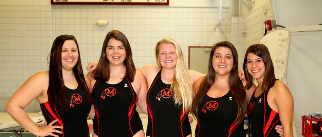 CELEBRATING SENIOR day are the MHS girls swim seniors from left, Captain Ariana Swift, Olivia Terranova, Captain Anna Steele, and Bea Affatato (missing from photo Olivia Izzi)