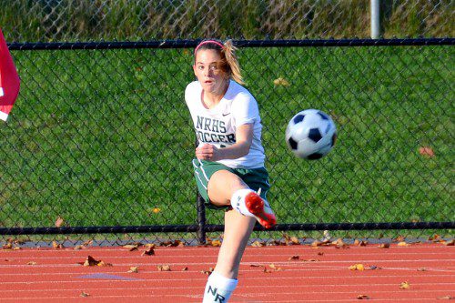 NICE EFFORT. Junior Jordan Schille executes a perfect corner kick against Lynn Tech. (John Friberg Photo)