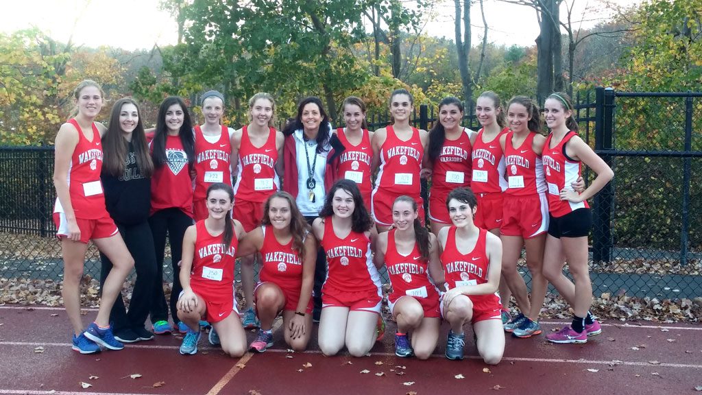 THE WMHS girls’ cross country team captured its fourth consecutive Middlesex League Freedom division championship with a 25-30 victory over Burlington yesterday afternoon at Burlington High School. Wakefield finished with a 5-0 record in the division. Members of the team include Abigail Harrington, Maeve Conway, Reilly McNamara, Sara Custodio, Emily Hammond, Lauren Sallade, Joanna Hammond, Catherine Urbano, Jordan Stackhouse, Hailey Bishop, Gillian Russell, Emmalee Connors, Marissa Pesce, Victoria Popp, Sarah Filleul, Sam Ross and Cubra Umit. The head coach is Karen Barrett.