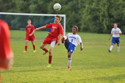 BRAEDAN LANGLOIS, a sophomore forward (#7), scored Wakefield’s only goal against Lexington in a 3-1 loss in the Kicks For Cancer Tournament. The Warriors rebounded with a 3-0 win over Burlington but were edged by Arlington, 3-2, yesterday afternoon. (Donna Larsson File Photo)