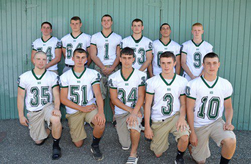 HORNET SENIORS will play their final game for the Green and Gold when they take the field against Lynnfield on Thanksgiving. First row, from left: Cole Hughes, Ryan DeGrande, Tyler Currier, Nick Fortin, Kyle Sampson. Second row: Dean Arena, John Keieger, Mike Farrelly, Austin Bradley, Greg Kalogeropoulos, Chris Jessop. (Bob Turosz Photo)