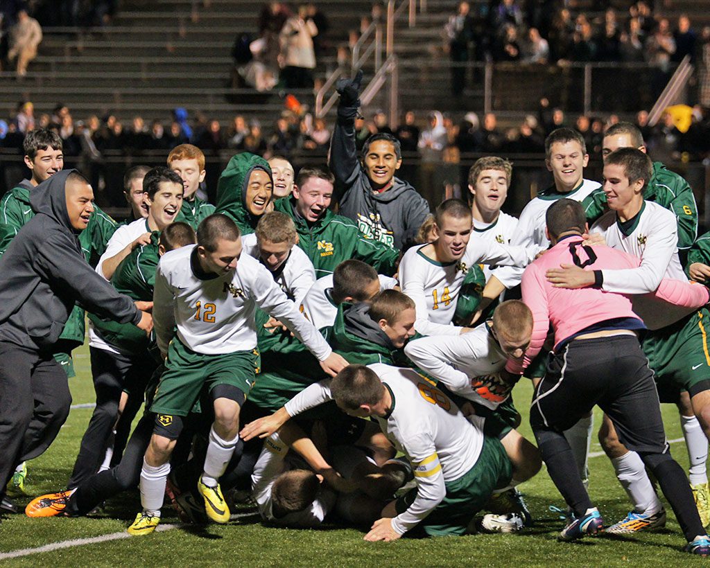 THE JUBILANT Hornet soccer team celebrates after defeating Wilmington in the semi finals to advance to the Division 3 North final. (John Intorcio Photo)