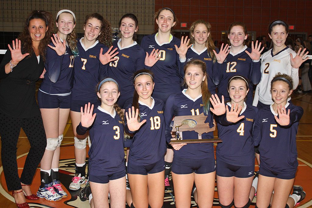 THE VOLLEYBALL TEAM celebrates winning their fifth straight Division 3 North championship after the Pioneers defeated Notre Dame 3-0 in the finals at Woburn Memorial High School on Nov. 8. Back row, from left, head coach Michelle Perrone, Katie Nugent, Jessica Badger, Jessica Morelli, MaryKate Deighan, Kaitlin Flannery, Shannon Ryan and Jessica Dwyer. Front row, from left, Rebecca Albanese, Sarah Mezini, captain Emma Mancini, Olivia Pascucci and Cameron Foley. (Dan Tomasello Photo)