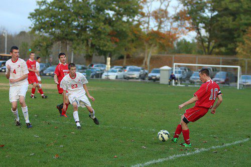 SENIOR FORWARD Neil Fitzgerald (#10) scored the lone Warrior goal last night in Wakefield’s Div. 3 North first round tournament game against Watertown. Wakefield was edged by the Red Raiders, 2-1, at Victory to have its season come to an end. (Donna Larsson File Photo)