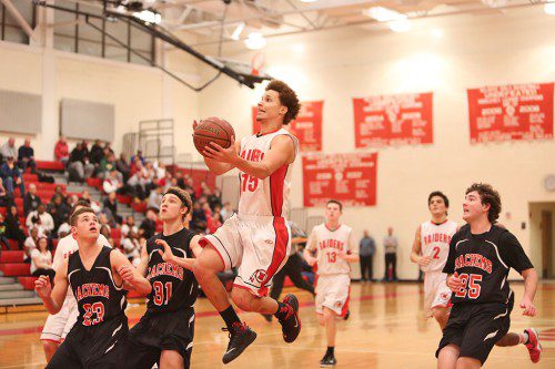 ANTHONY GILARDI powered Melrose to a 56-54 win over Winchester Tuesday night with 23 points. (Donna Larsson photo)