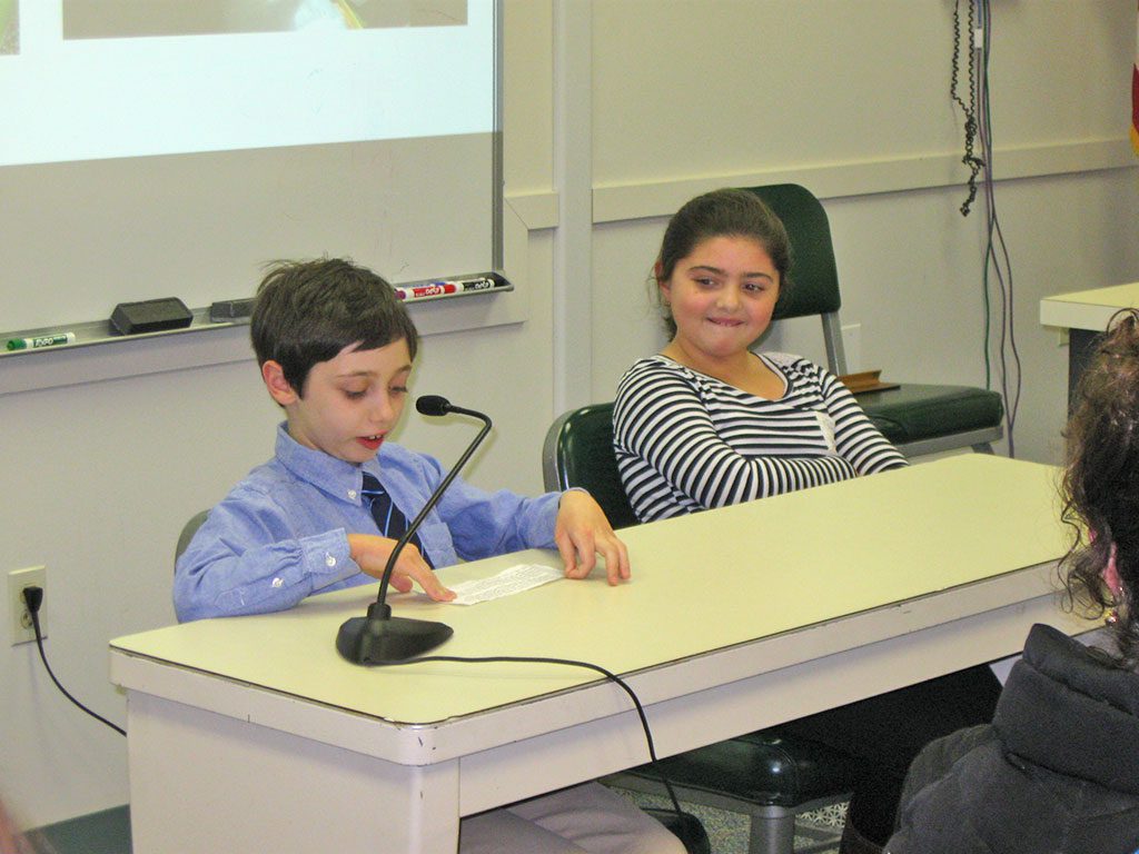 THIRD GRADERS Michael Savio and Adrianna Pascuccio gave an overview to the School Committee of their study of plants in their life sciences classes. (Maureen Doherty Photo)