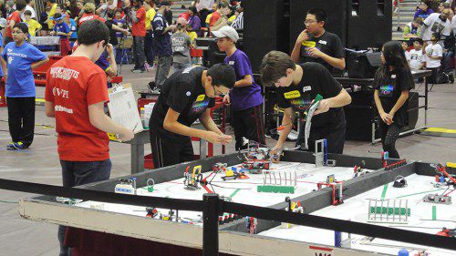 PRESTON YEE AND COLE KRAUS at the competition table.