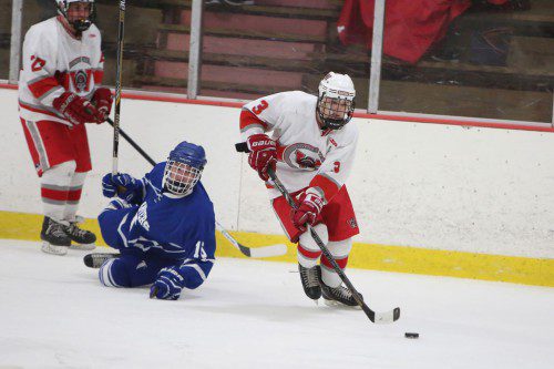 ZACH SALAMONE, a senior forward (#3), scored Wakefield’s lone goal yesterday against Lynnfield. In the back is junior defenseman Steven Melanson (#27). The Warriors and Pioneers played to a 1-1 tie in the consolation game of the South Division in the Kasabuski Christmas Tournament. (Donna Larsson File Photo)