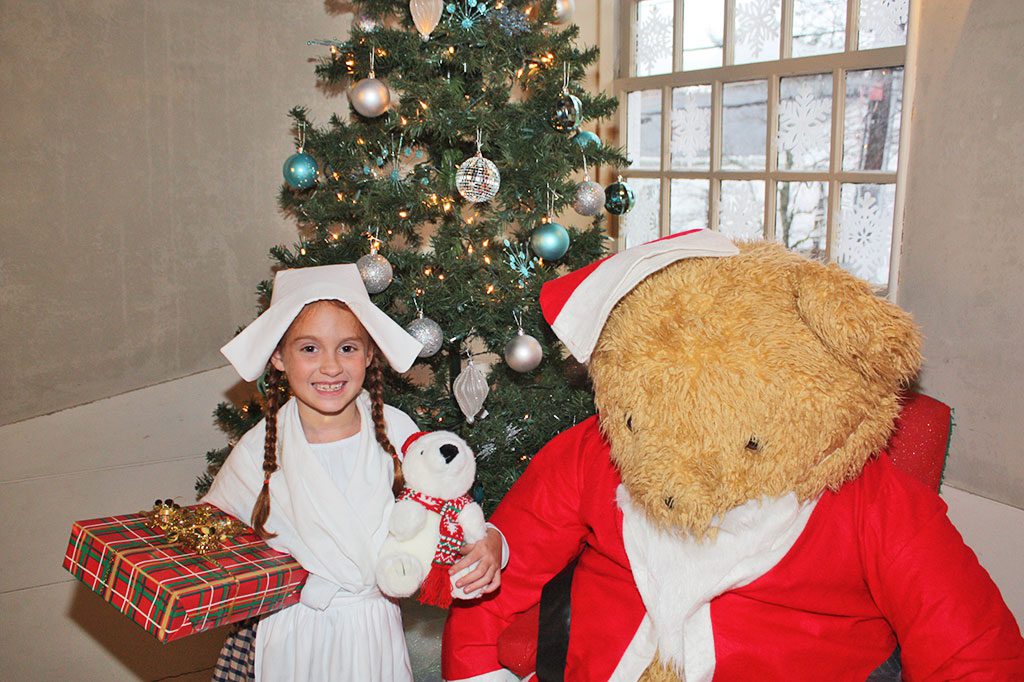 SEVEN-YEAR-OLD Madison Goodman decided to skip the Black Friday madness this year and do all of her holiday shopping at the Lynnfield Historical Society’s 52nd annual Country Store on Dec. 6. Proceeds from this year’s Country Store will be used to maintain the Meeting House. (Dan Tomasello Photo)