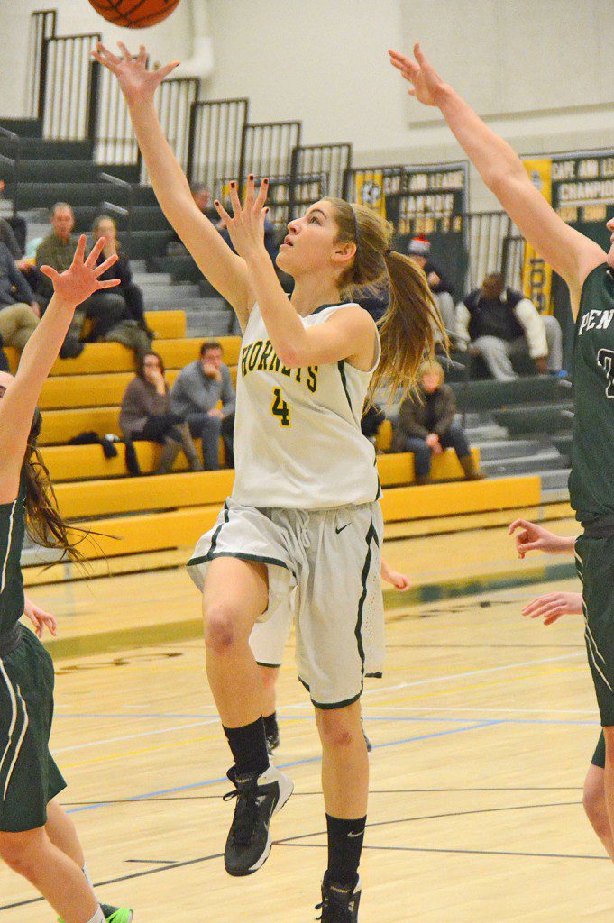 FRESHMAN GUARD Kirsten Bradley goes up for two points against Pentucket. (John Friberg Photo)