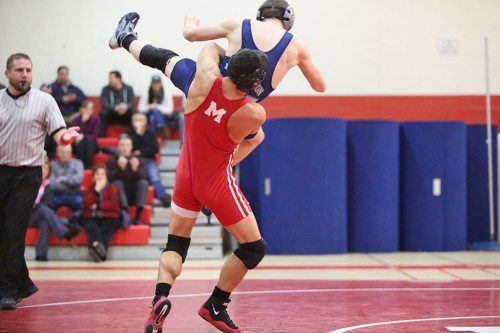 CHRIS REALE is among those hard hitting Raiders who are leading the MHS wrestling team in a winning campaign. (Donna Larsson photo)