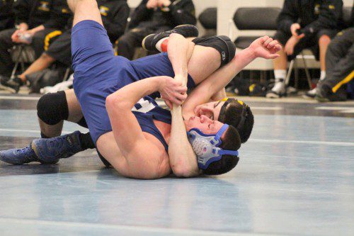 SENIOR Garrett Anderson (at left) improved his dual meet record this season to 6-0 after pinning his Peabody opponent in 2:15 in the 145 lbs. weight class on Jan. 23. Anderson has won all of his matches this season by pin. The Black and Gold defeated Peabody 45-6. (Courtesy Photo)