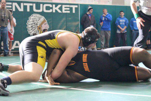 SENIOR Brandon Troisi (at left) was crowned champion of the 285 lbs. weight class during the Pentucket Holiday Tournament on Dec. 27. He defeated a Josiah Quincy wrestler by fall in 1:56 while on his way to the 285 lbs. weight class title. (Courtesy Photo)