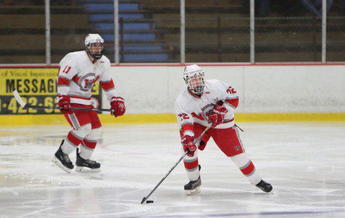 DEFENSEMAN DOM Bruno (#22) controls the puck while teammate Ben Coccoluto (#11) looks on. The Warriors played a pretty good game against Wilmington last night at the Kasabuski Arena but lost by a 3-1 tally. (Donna Larsson File Photo)