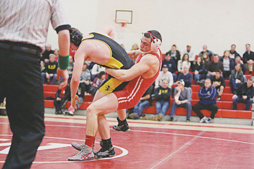 The Melrose Red Raider wrestling team put on a strong showing at the Div 3. State Championship, including Melrose’s Mike Doucette. (Donna Larsson photo)