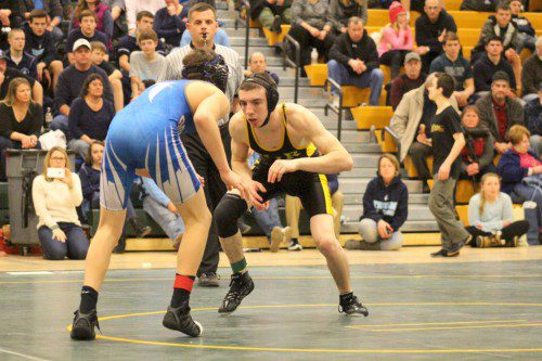 SENIOR CAPTAIN Joe Morse (at right) finished second in the 113 lbs. weight class during the Division 3 North Sectional Tournament on Saturday, Feb. 14 at North Reading High School. Morse’s second place finish enabled him to become a three-time sectional place finisher. (Courtesy Photo)