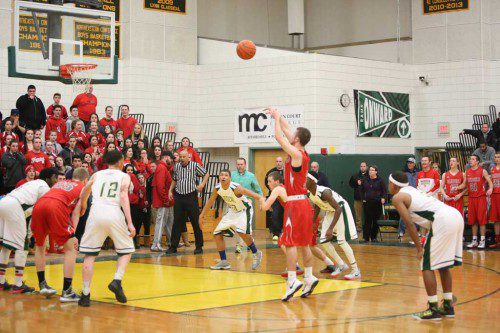 SENIOR GUARD Brian Dickey takes one of his free throws during crunch time in Wakefield’s 49-46 triumph over Lynn Classical on Monday in a Div. 2 North preliminary round game. The Warriors will be looking for another clutch effort when they take on top-seeded Danvers tonight in a first round game at Danvers High School. (Donna Larsson File Photo)
