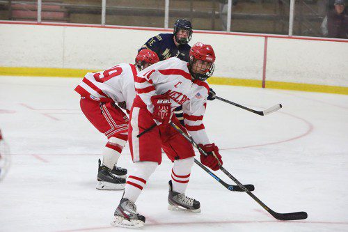 IT’S TOURNEY time for the Red Raider hockey team, who sailed into playoff qualification with a recent win over Wilmington. Melrose’s defense is being held steady by senior captain Jake Karelas (pictured) (Donna Larrson photo)