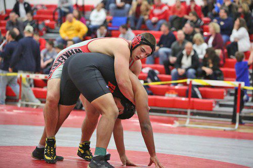 DAN WENSLEY, a senior (left), became the first Warrior wrestler to win three sectional titles as he was crowned the champion of the 195 weight class at the Div. 3 North meet on Saturday. Wensley posted a 3-0 record and has qualified to compete in the Div. 3 state meet on Friday and Saturday at the Charbonneau Field House. (Donna Larsson File Photo)