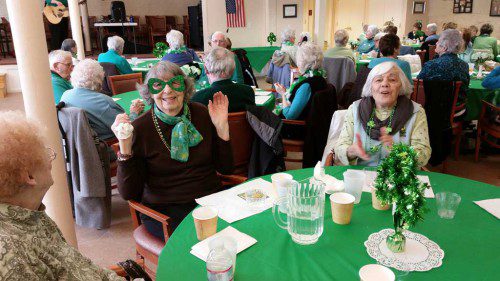 LOCAL SENIORS enjoyed a St. Patrick’s Day Brunch on Friday, March 13, at the McCarthy Senior Center. Here, Claire MacGregor and Lucy Defeo enjoy the festivities.