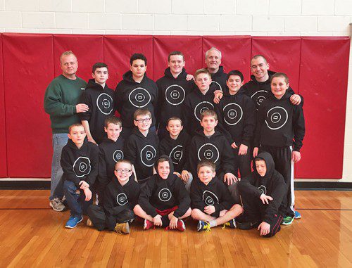 The Melrose Youth Wrestling team gathered recently for a team photo. Pictured, 1st row sitting -l-r Sean Thomas, Stephen Fogarty, Bobby Morrison, CJ Boyce. 2nd row kneeling- Jake Pettipaw, Shea Fogarty, Liam McCauley, Max Pettipaw, Jude Douglas. Standing: Coach MacIntosh, Kevin Carney, Jan Mejia, Jackson Curran, Stephen MacIntosh, Sean Herbert, Jude Douglas. Back Row Coach Morrison, Coach Jeremy Chavarria. (courtesy photo)