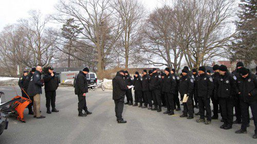 A COMPANY of about 40 NEMLEC officers arrived in Wakefield last night to assist in the search of a missing woman. Also responding to the call were three State Police K-9s and five NEMLEC K-9s. The woman was located this morning, safe and healthy, police said. (Gail Lowe Photo)