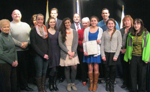 REPRESENTATIVES OF The Scholarship Foundation of Wakefield appeared before the Board of Selectmen to tell them about the Foundation’s upcoming 35th annual Phonathon on Saturday, March 21, from noon to 4 p.m. On that date, students will be calling local residents to request donations. Cathy Donovan, vice president of The Scholarship Foundation of Wakefield (TSF) told the selectmen that over the last 55 years the Foundation has helped over 10,000 Wakefield students. In 2014, TSF distributed $463,700 to 270 Wakefield students based on financial need. Front row from left, TSF student director Maddie Shea, president of student directors Carolyn Harney, student directors Emily Attaya, Meagan Gibbons, Carolyn Sweeney and Rachel Semel. Back row, Selectmen Phyllis Hull, Tiziano Doto, Ann Santos, Patrick Glynn, Paul DiNocco, Betsy Sheeran, Chairman Brian Falvey and TSF vice president Cathy Donovan. (Mark Sardella Photo)