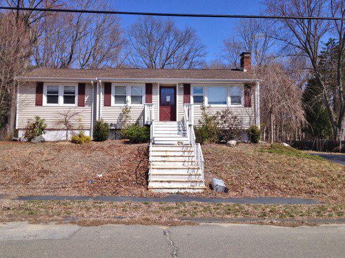 AT A BOARD OF APPEALS HEARING, the applicant withdrew a petition to relocate this house at 17 Anthony Rd. in the face of neighborhood opposition. (Bob Turosz Photo)