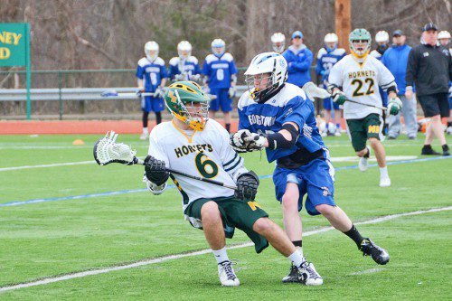 NATE DISTASIO avoids a Georgetown defender as the Royals invaded the Arthur Kenney field last week. (John Friberg Photo)