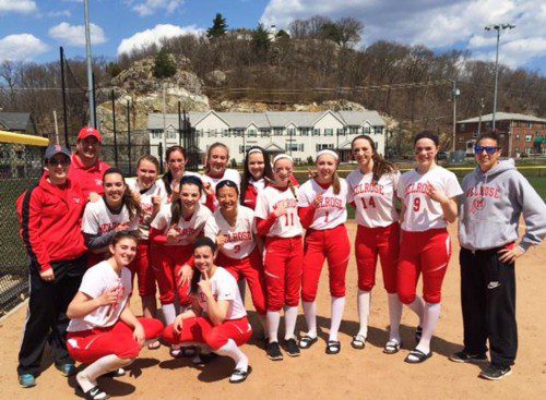 MEMBERS OF the Melrose High School girls varsity softball team celebrated their 10-6 upset victory over Burlington on April 22 at Pine Banks Park. (courtesy photo) 