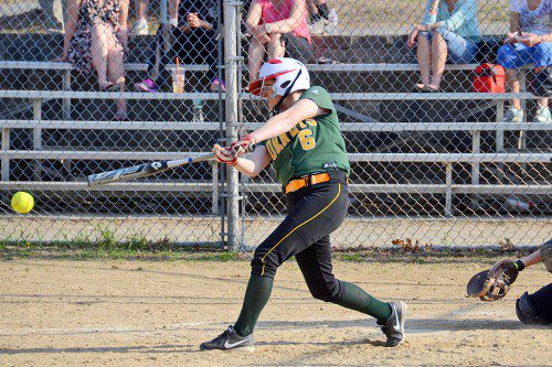 SENIOR BRYANNE RILEY, (6), rips a single into center field. (John Friberg Photo)