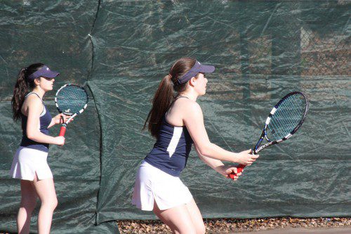 THE SECOND doubles duo of Rachel Maglio (left) and Amanda Stelman play deep against their opponents. They lost to the Sachems in a close three set match on May 4, but the Pioneers defeated Pentucket 4-1 and remain undefeated. (Maureen Doherty File Photo)