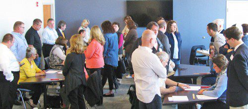 SATURDAY'S RECOUNT took about three hours to complete. Christopher Barrett was confirmed as selectman by a 36-vote margin. His vote tally of 1,354 did not change. Challenger Katy Shea picked up three votes to finish with 1,318. (Mark Sardella Photo)