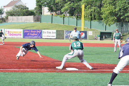 LEAP of faith. Andrew Robins dives head-first toward third base on what was to be the final play of the Pioneers' 4-3 loss to Austin Prep in the Div. 3 North semifinals. Aggressive base running was a key component of the team's success this season. (Maureen Doherty Photo)
