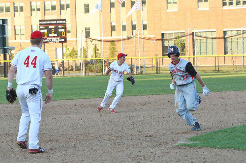MELROSE'S DEREK SCIMEMI throws out a Marblehead runner during Melrose's heartbreaking 2-1 playoff loss to Marblehead at Morelli Field on Friday, June 5. (Donna Larsson photo) 
