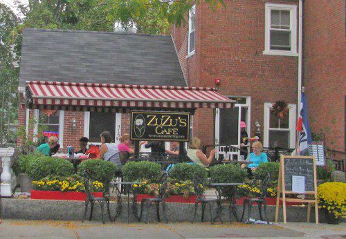 TUESDAY was at least rain free, making it a pleasant day for outdoor dining at Zuzu's on Main Street. (Mark Sardella Photo)