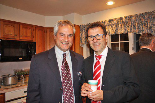 FRIENDSHIP GAMES. Danielie Balanini (left) of the Boston Braves and Michael Jordan, a 12-year member of Bayern Munich, socialize at the post-game party hosted by Braves President Spiros Tourkakis Saturday night. (Maureen Doherty Photo)