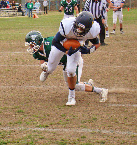 JUNIOR Kyle Hawes (8) tumbles into the end zone for the first Pioneer touchdown of the day. The junior caught eight passes for 77 yards during the Pioneers’ 28-27 loss to Pentucket Nov. 7.  (Tom Condardo Photo)