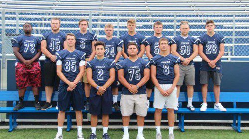 THE SENIORS will suit up for the last time in a Pioneer uniform on Thanksgiving Day to take on their rivals, the North Reading Hornets. Both teams won their respective CAL division titles so the winner of this game will have de facto bragging rights as the overall CAL champ. Front row, from left: captains Louis Ellis, Alex Boustris, Michael Stellato and Kyle Hawes; back row, from left: James Ofori, Nate Wester, Jared Lemieux, Alex Gildea, Michael Landau, Zachary Karavetsos, Nick Contardo and Paul Barrera. (Kerrianne Allain Photo)