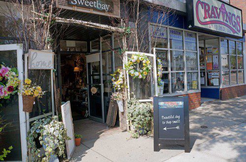 FIFTY A-FRAME chalkboard signs like this one will be deployed in the town’s business districts as a way to promote the idea of shopping locally.